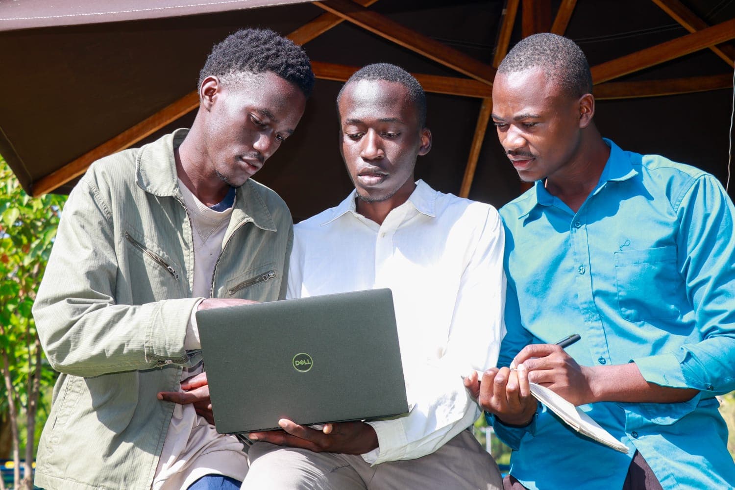 The ATIH team working in the field with a client